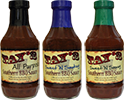 Bottles of Tay's All Purpose, Sweet 'N Smokey, and Sweet 'N Sassy Southern BBQ Sauces